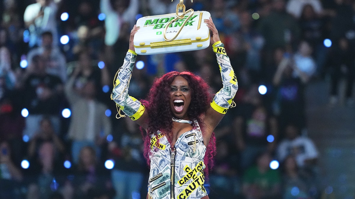Naomi with the briefcase