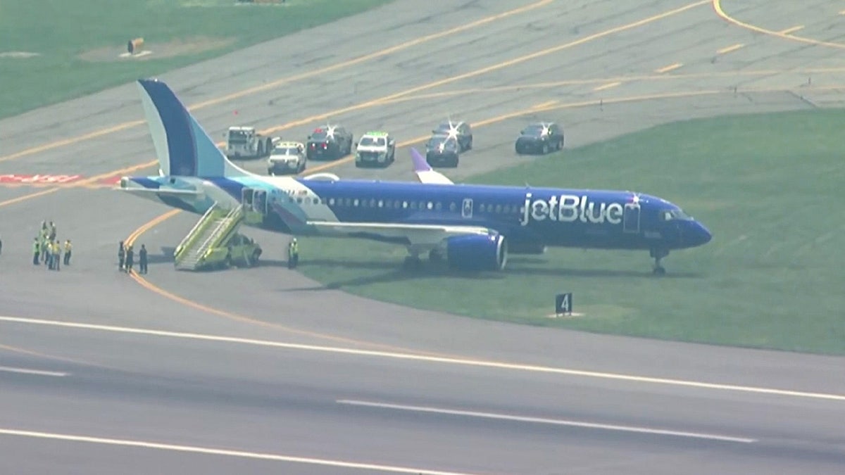JetBlue airplane skids off the runway at Boston airport