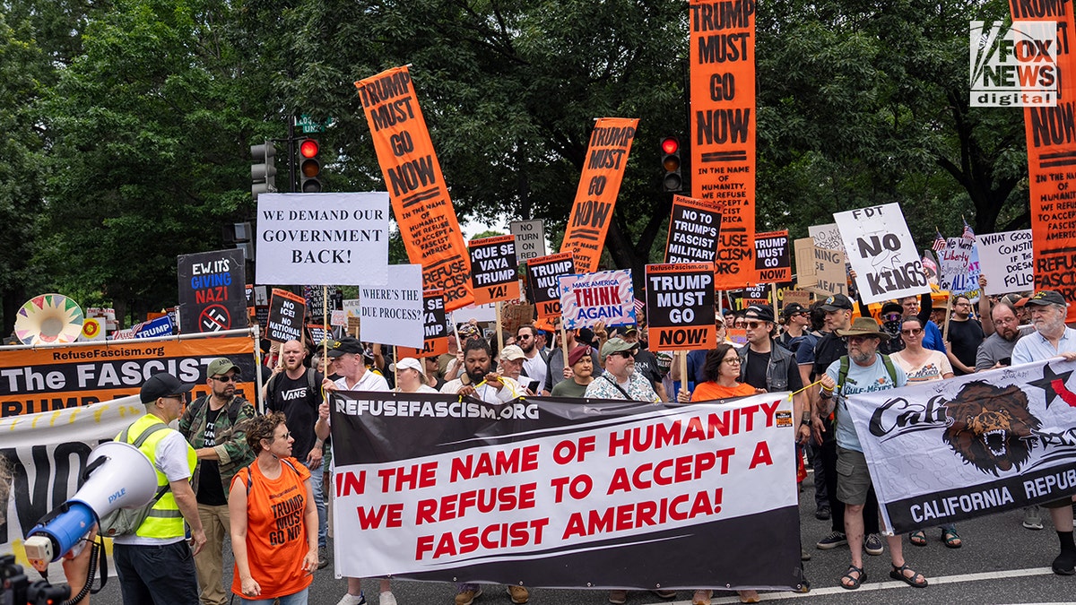 Anti-Trump protesters march successful DC