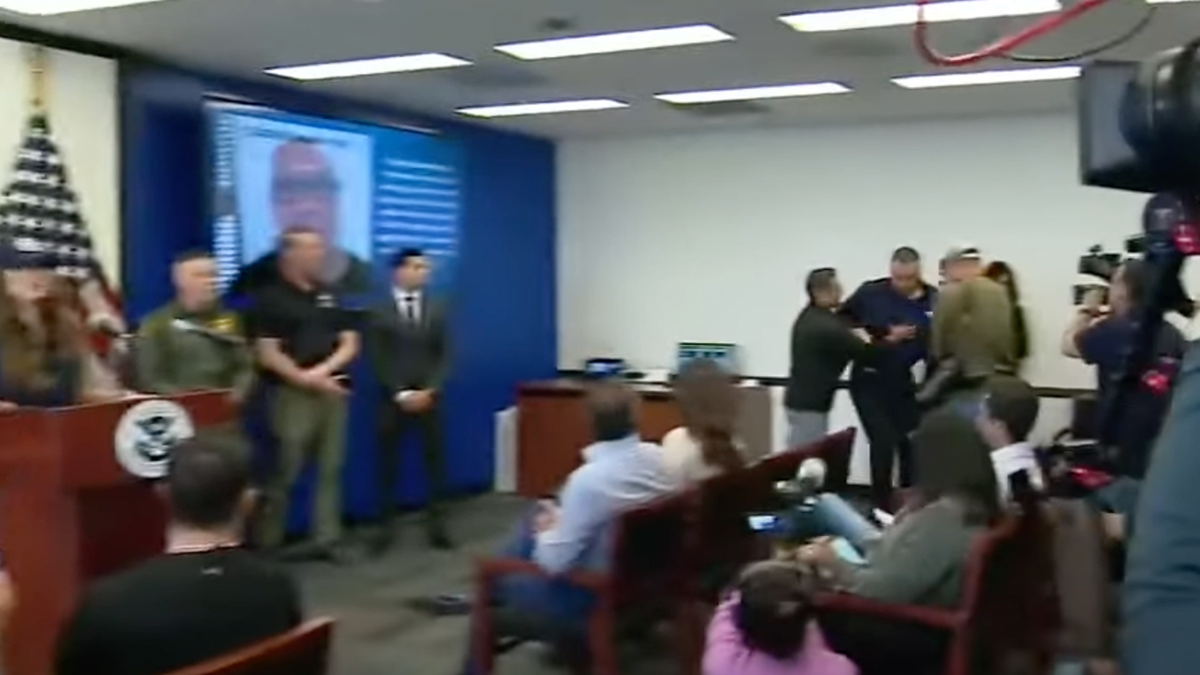 Sen. Alex Padilla was seen near Sec. Noem's podium at the news conference.
