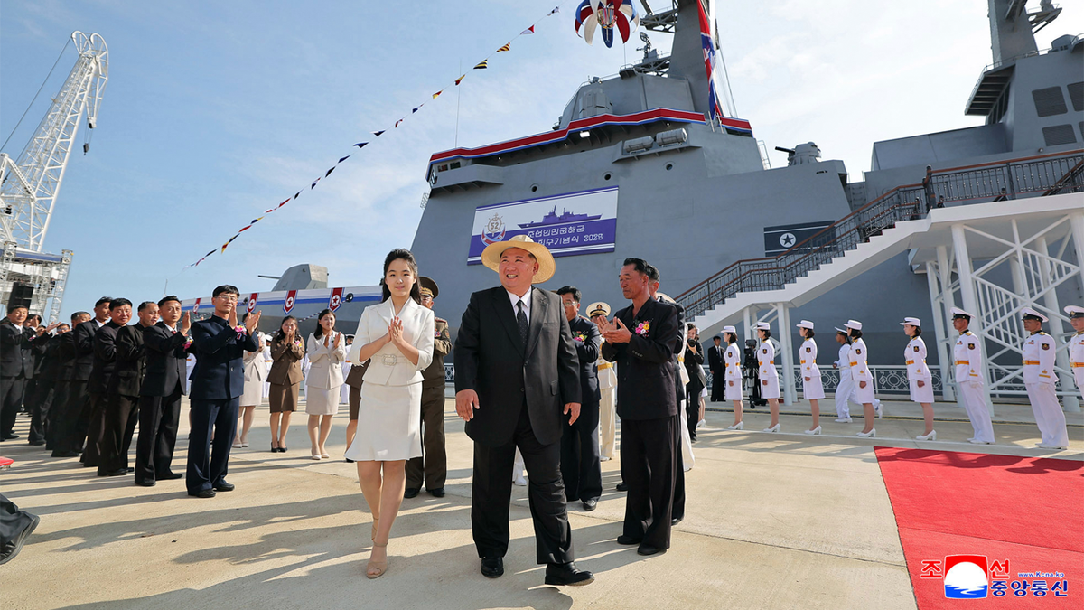 Kim Jong Un at the relaunch their warship