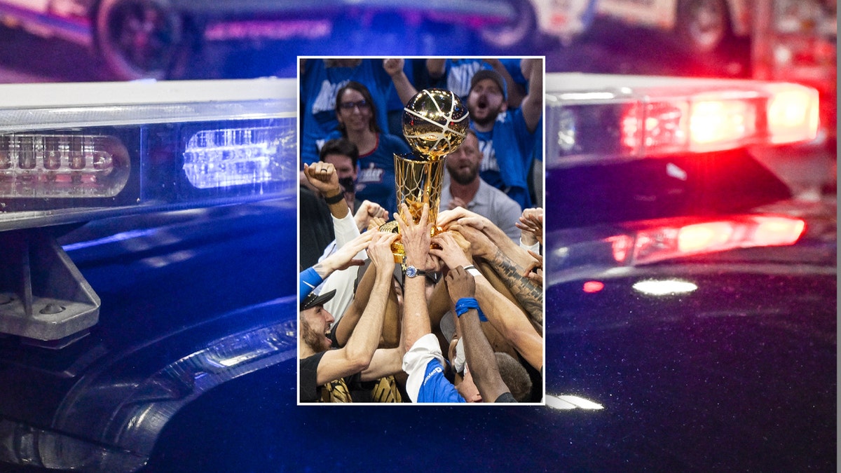 Oklahoma City Thunder NBA Finals trophy with police lights in background