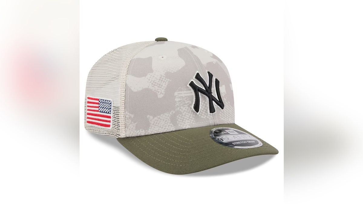 Support your favorite MLB team and the armed forces with these trucker hats from New Era.