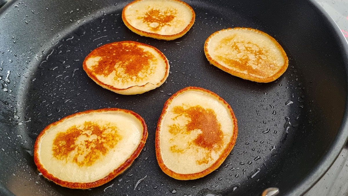 pancakes cooking on skilet