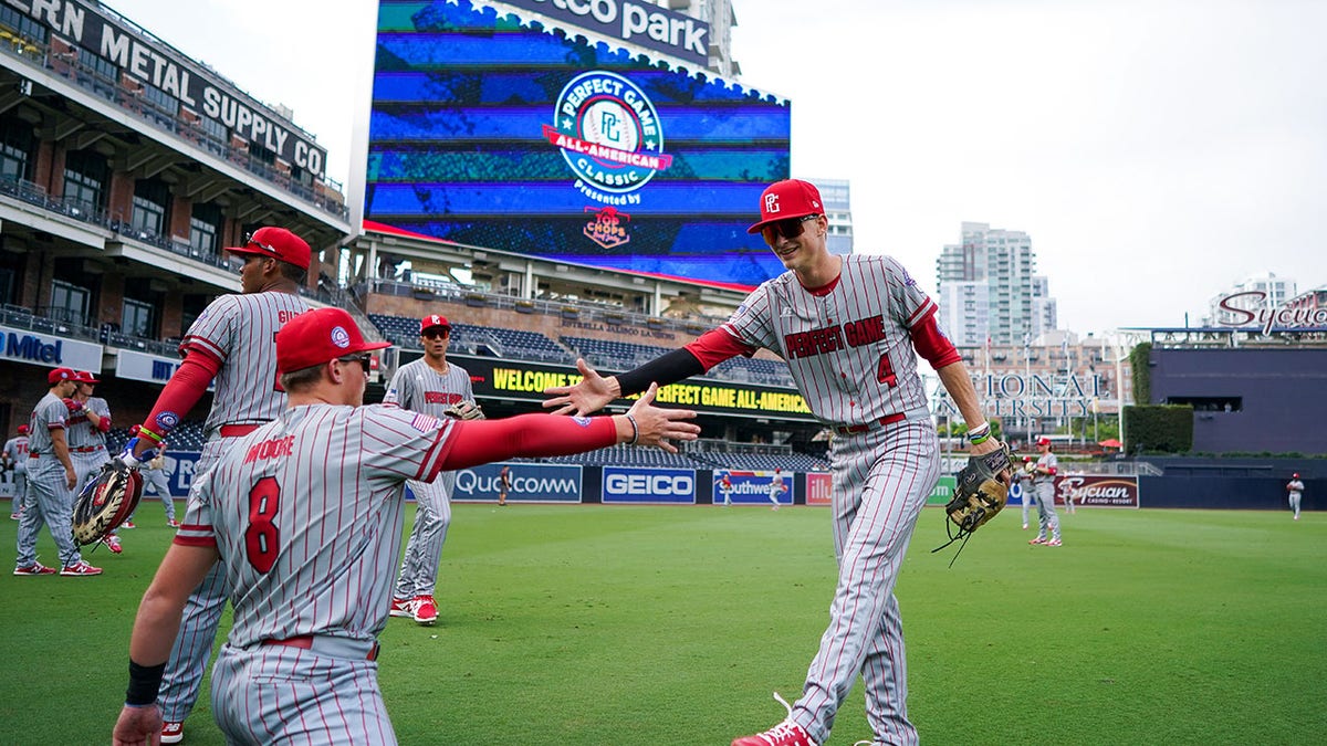 Players high-five each other