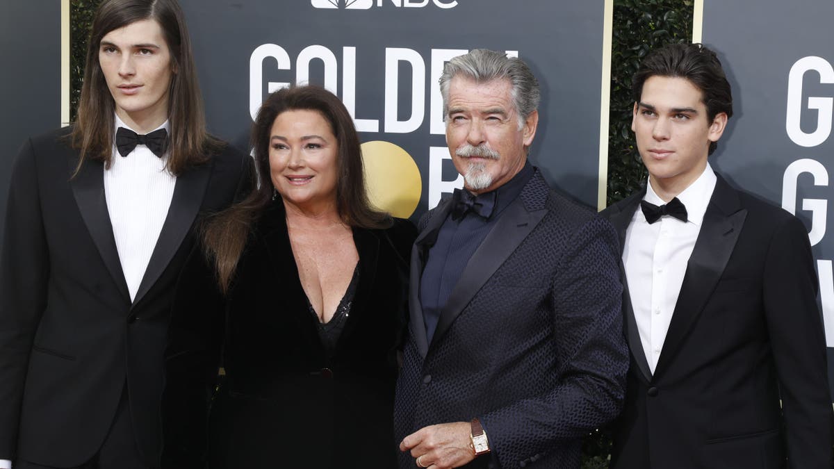 Pierce Brosnan with his woman and 2 youngest sons