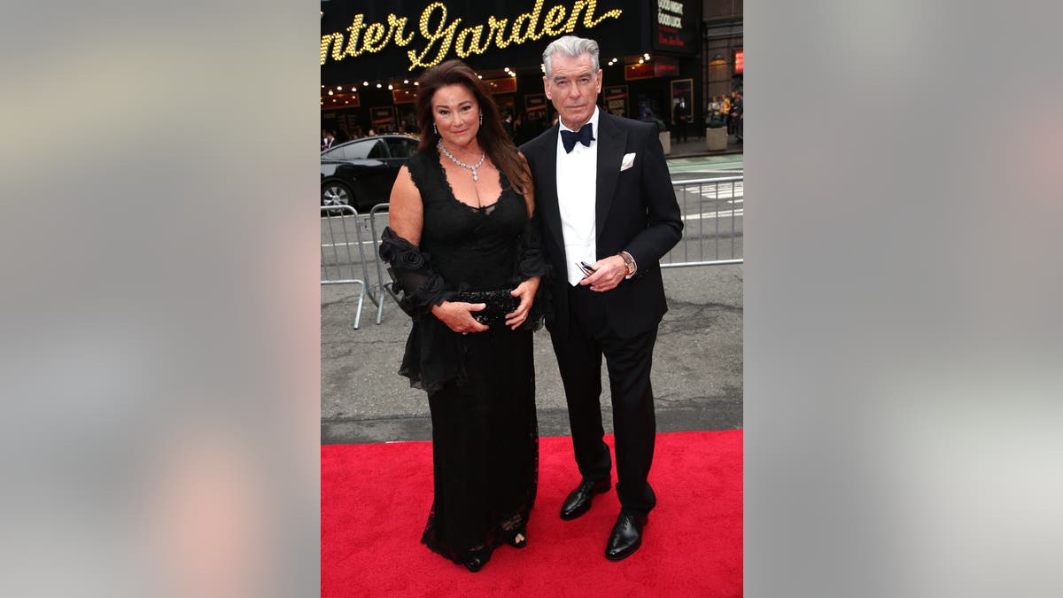Pierce Brosnan with woman Keely Shaye Smith connected the reddish carpet
