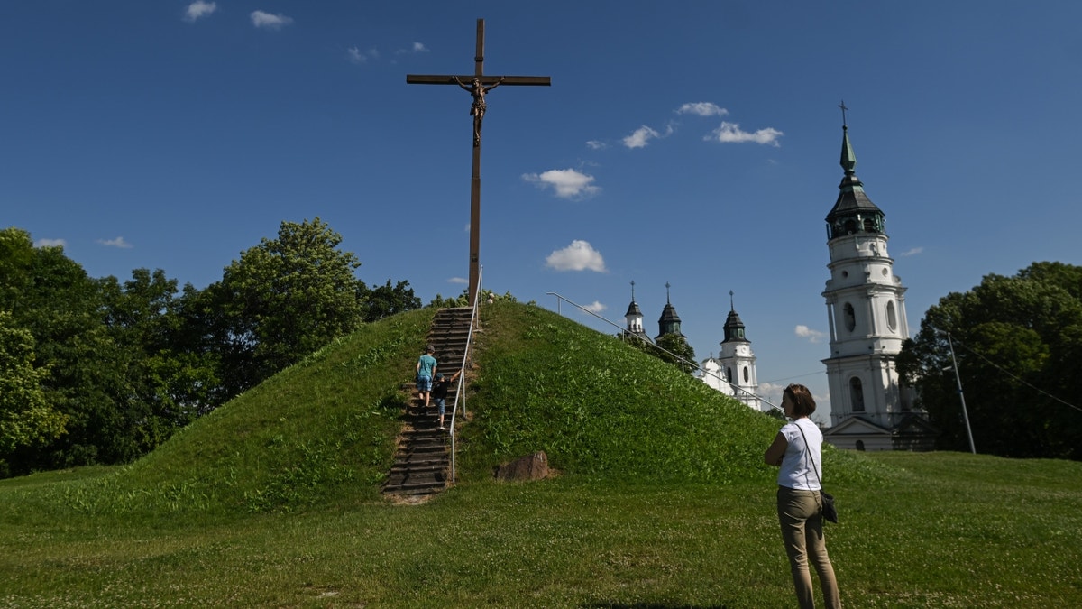 People adjacent Chelm church