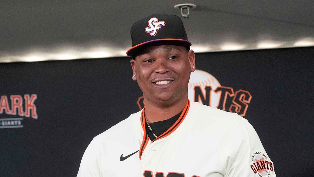 Rafael Devers joins Giants, willing to play anywhere after Red Sox trade 4 Rafael Devers wears Giants jersey