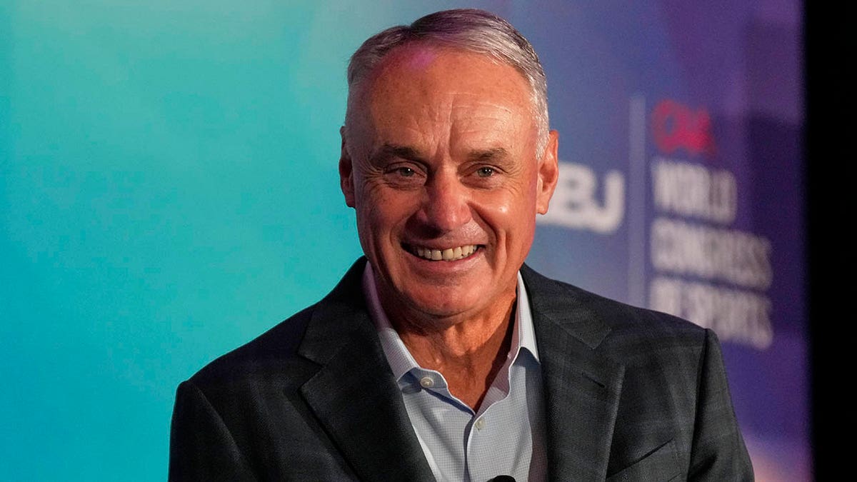 Rob Manfred smiles