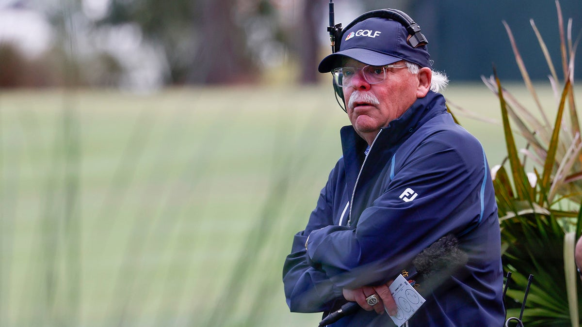 Roger Maltbie watches players