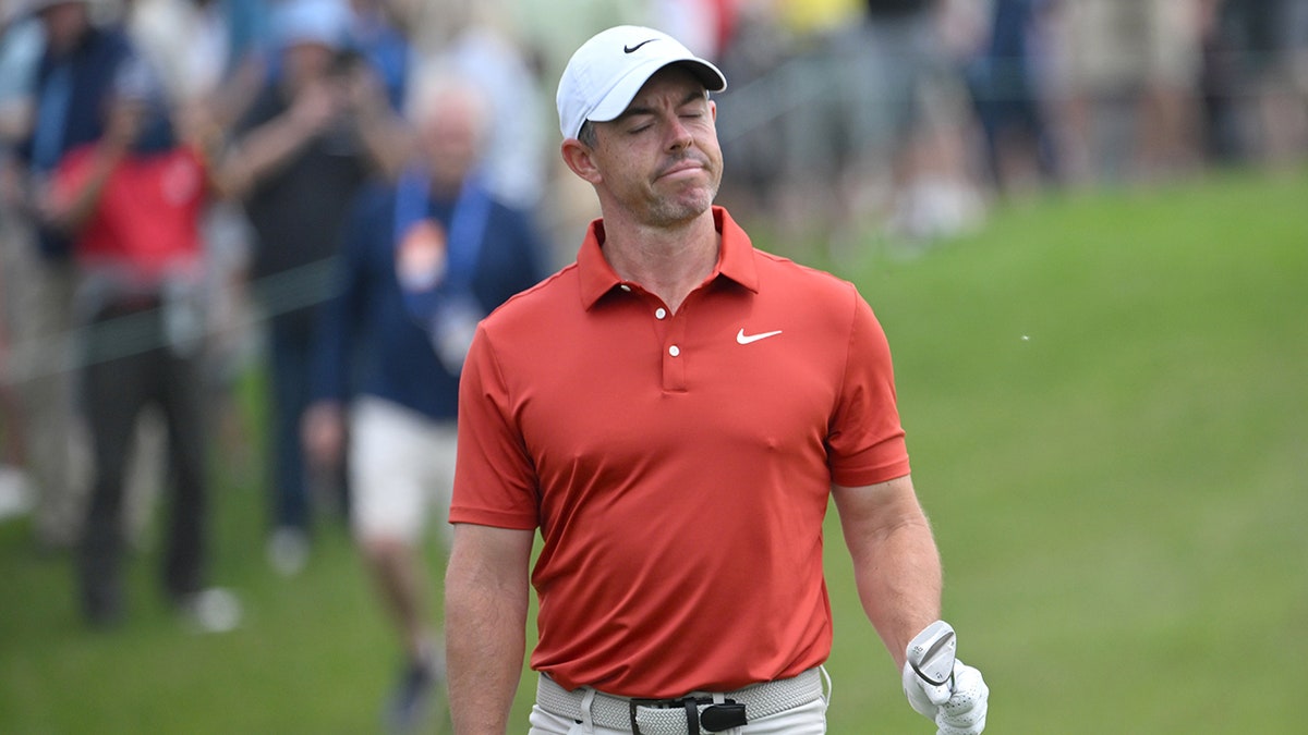 Rory McIlroy walks connected course