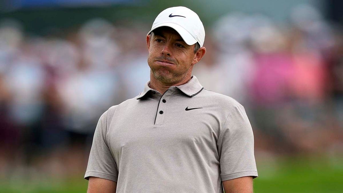 Rory McIlroy blows a raspberry