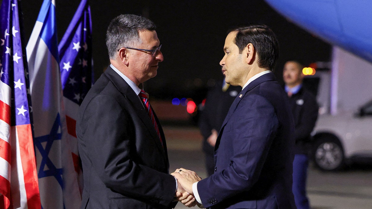 Israeli Minister of Foreign Affairs Gideon Sa'ar shakes hands with Secretary of State Marco Rubio