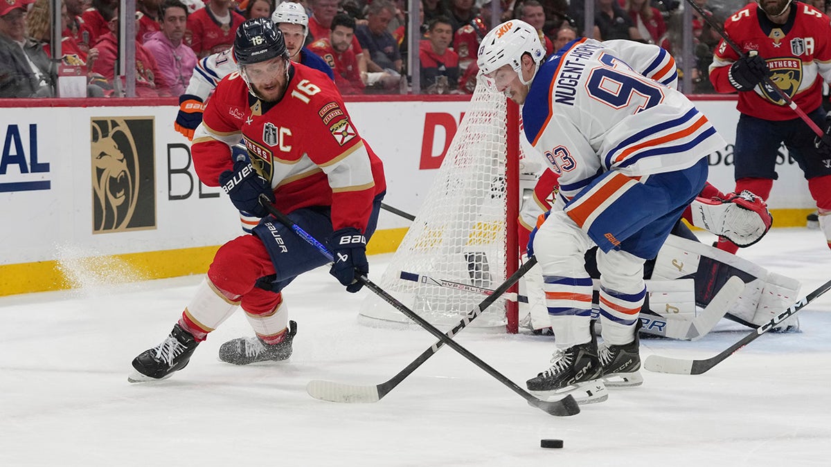 Aleksander Barkov controls the puck