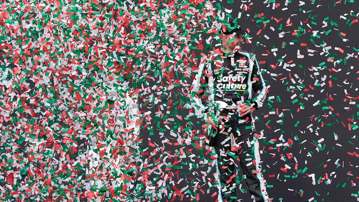 Confetti rains on Shane van Gisbergen