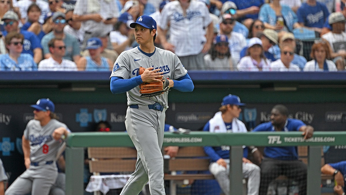 Shohei Ohtani walks to the pitching mound
