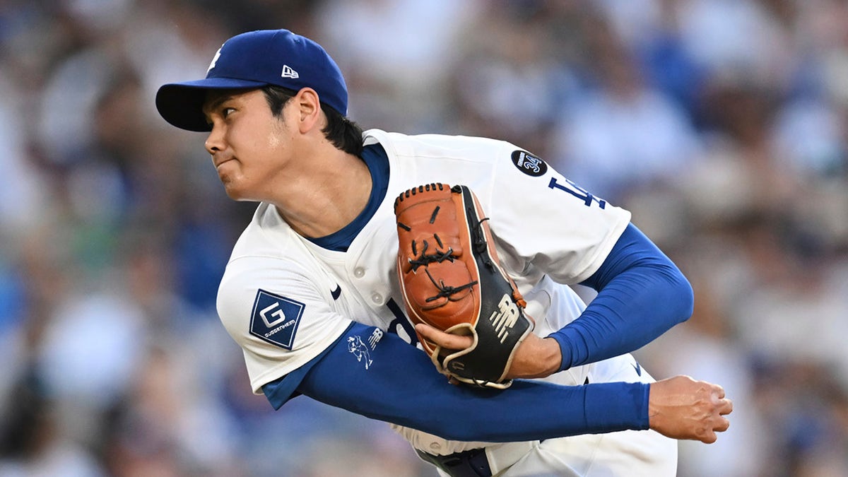 Shohei Ohtani throws a pitch