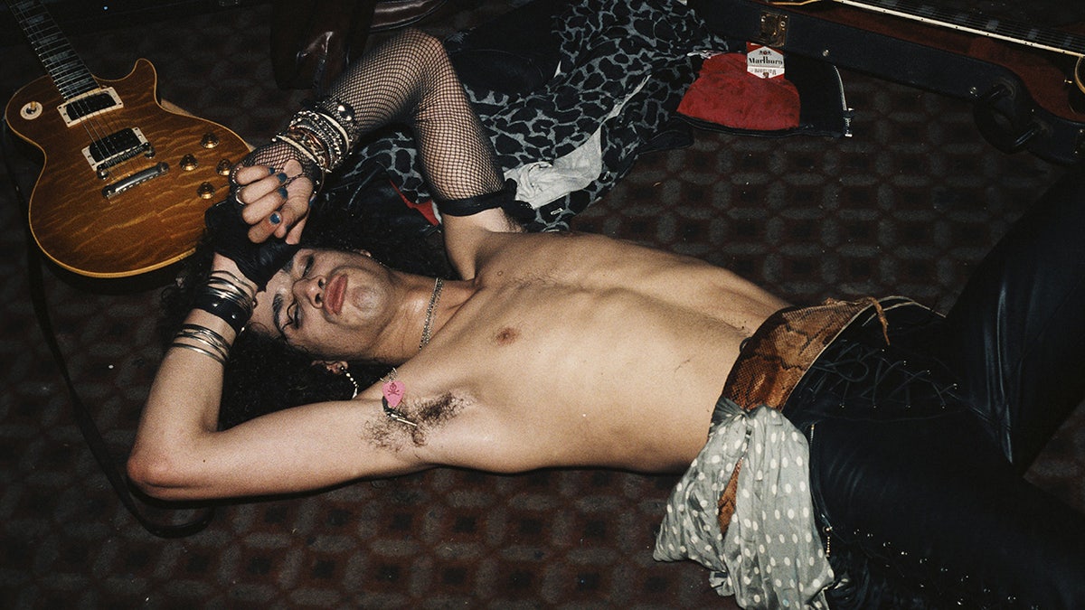 Slash laying connected nan level pinch his eyes closed.