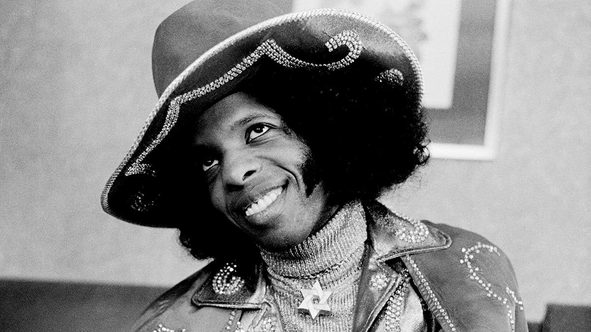 Sly Stone smiling