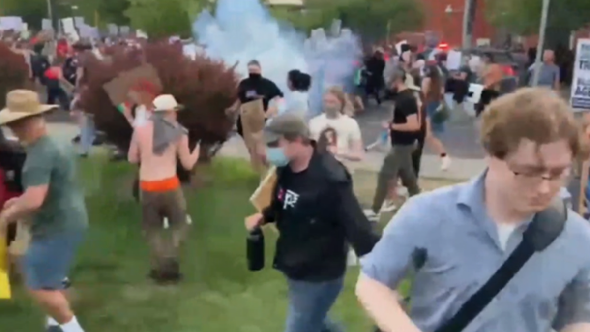 Tear gas scattered on the Spokan crowd