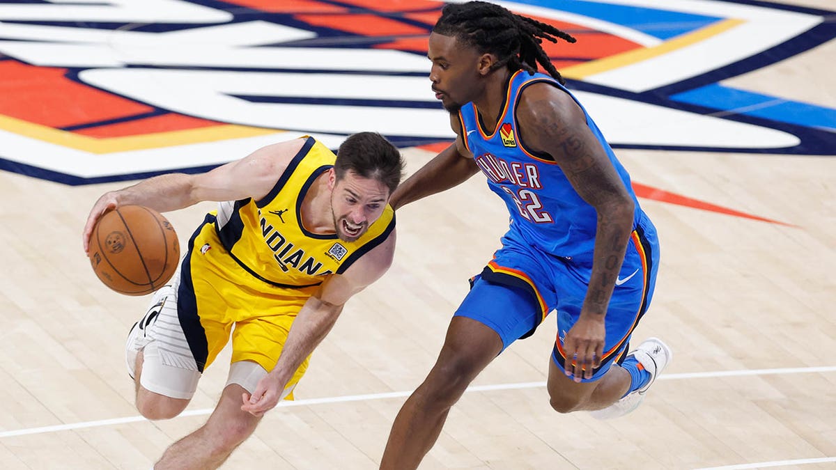 T.J. McConnell drives to hoop