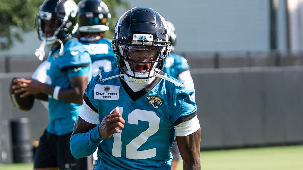 Travis Hunter directs the route