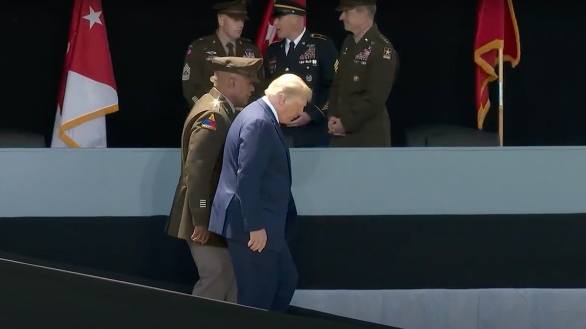 Trump goes down ramp