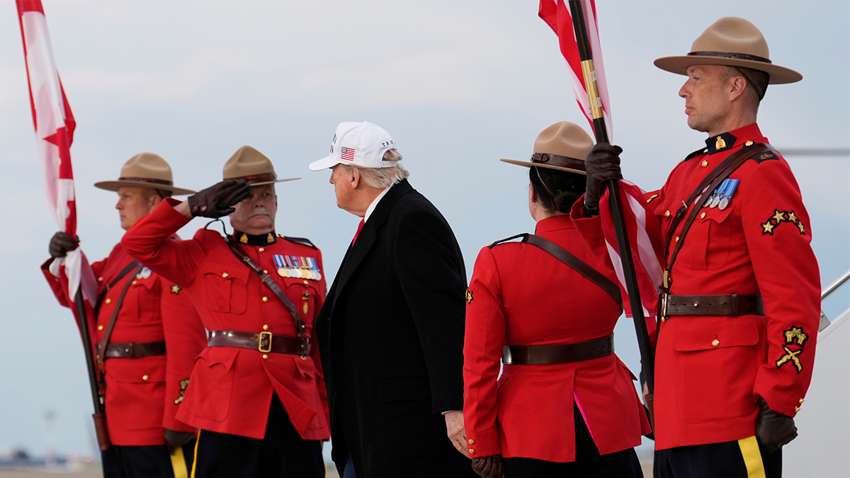 US President Donald Trump arrives in Air Force 1 at Calgary International Airport