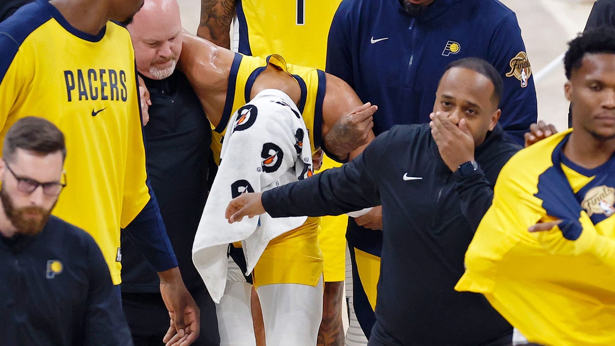Tyrese Haliburton helped off the floor