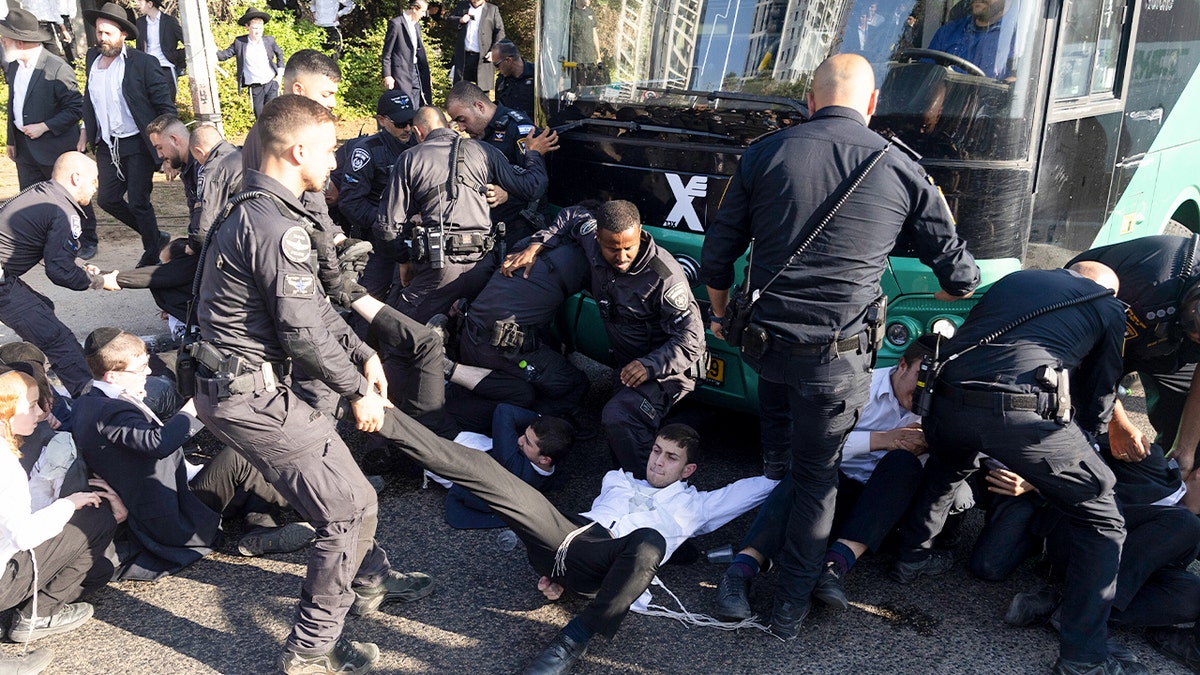 Ultra-Orthodox Israelis protest against mandatory military service