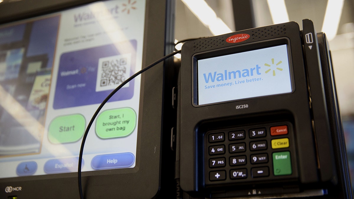 A Walmart self-checkout kiosk is shown.