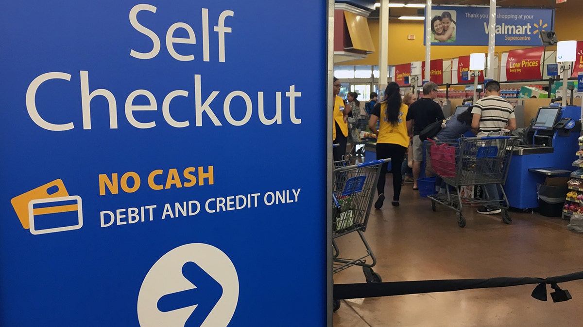 "Self Checkout No Cash Debit And Credit Only."