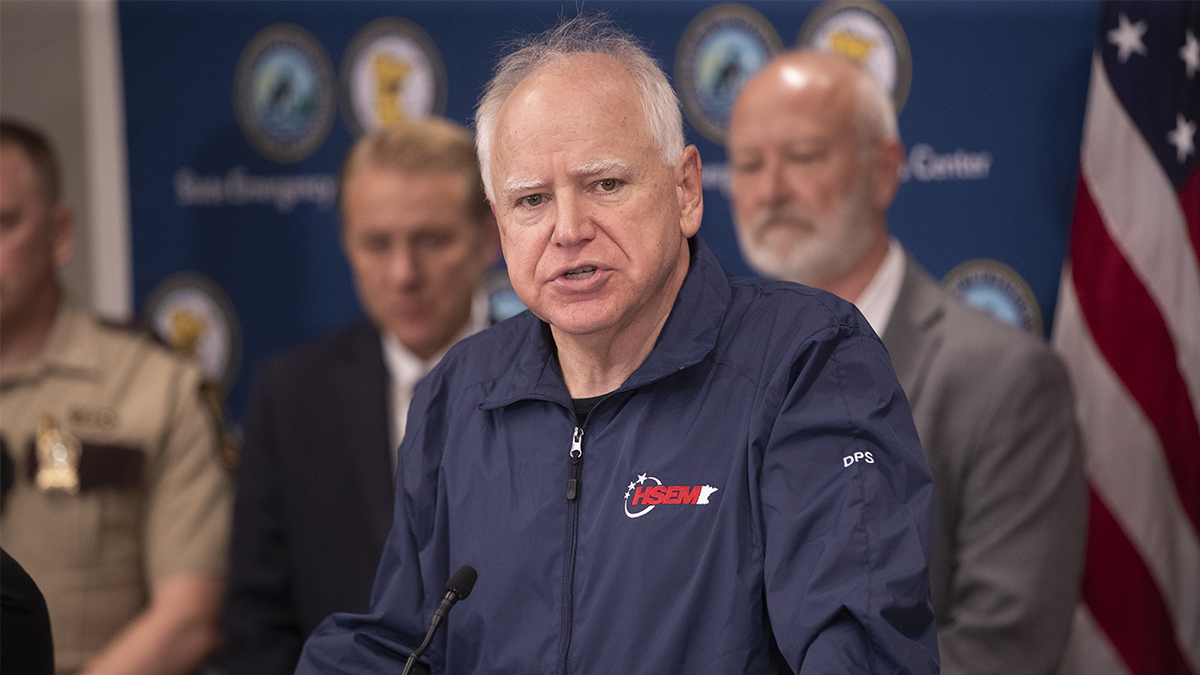 Gov. Tim Walz speaks astatine a property convention held astatine nan Minnesota Emergency Management Center pursuing nan apprehension of Vance Boelter.