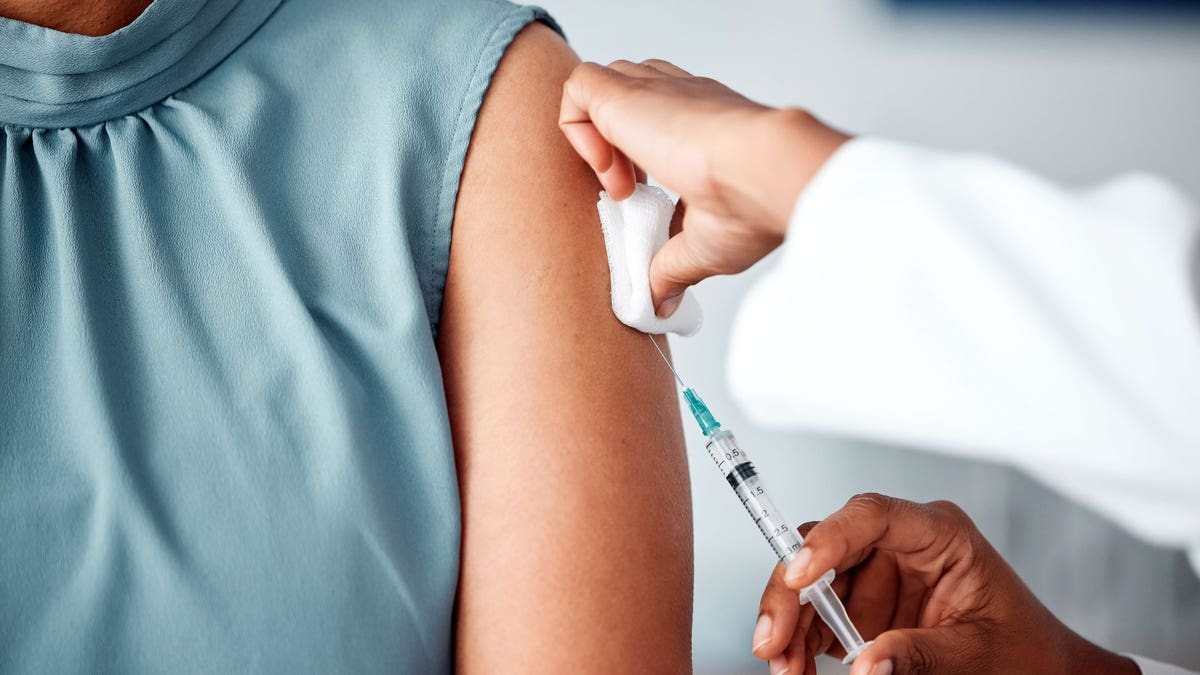 Woman getting vaccine