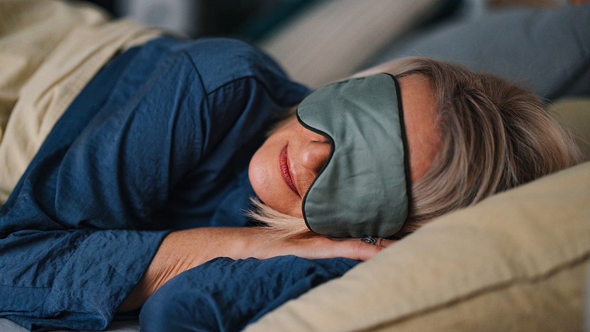 Study links frequent daytime napping to higher mortality in older adults 1 Close up shot of older woman sleeping with her eyes covered with a mask