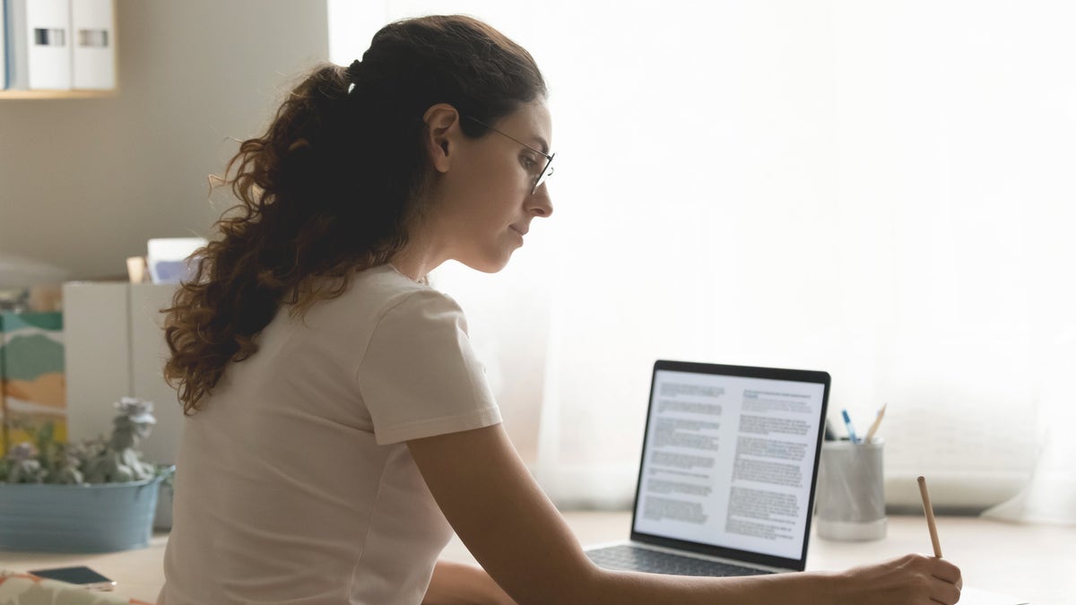 Woman penning effort connected computer