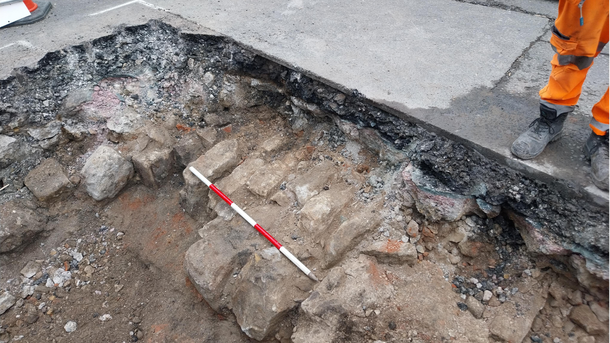 Dramatic sinkhole in York reveals remnants of large medieval St Leonard's Hospital 1 Worker standing next to bricks