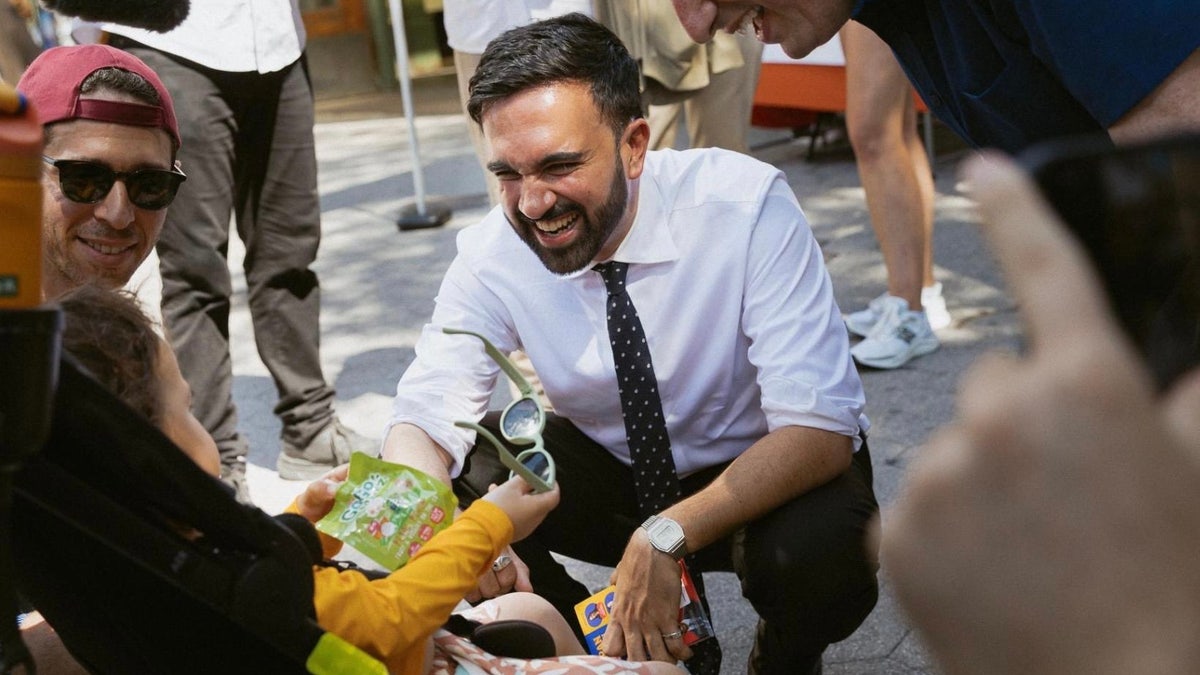 Zohran Mamdani, a New York State assemblyman and democratic socialist mayoral candidate for New York City, topped former Gov. Andrew Cuomo to win the June 24, 2025 Democratic Party primary. Mamdani is seen campaigning in New York City on primary day.