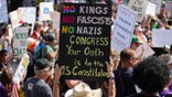 "No Kings" protesters gather outside the Texas State Capitol building in Austin, June 14, 2025.