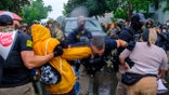 Federal agents, protesters clash in Minnesota