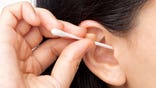 Woman Q-tip ear wax