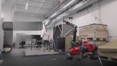 Quadruped robot plays badminton with you using AI