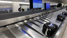 Newark baggage conveyor belt carries away 2-year-old boy, officers spring into action