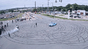 Unknown suspects takeover intersection with dangerous car stunts, fireworks - Fox News