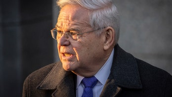 Menendez to report to prison for 11-year term for corruption