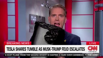 Scott Jennings puts head in trash bin to show how Republicans feel about Trump-Musk feud
