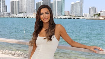 Eva Longoria flaunts figure in cheeky pink bikini during Spanish getaway