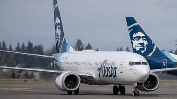 Passenger in custody after 'direct threat' to airplane shuts down Seattle Airport runways