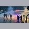 Police use water cannon in response to anti-immigrant violence in Northern Ireland town